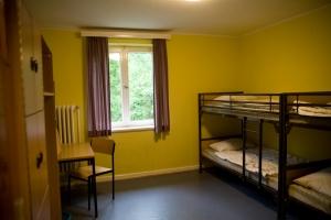 Die meisten Schlafzimmer im CISV Haus sind mit zwei Doppelbetten ausgestattet